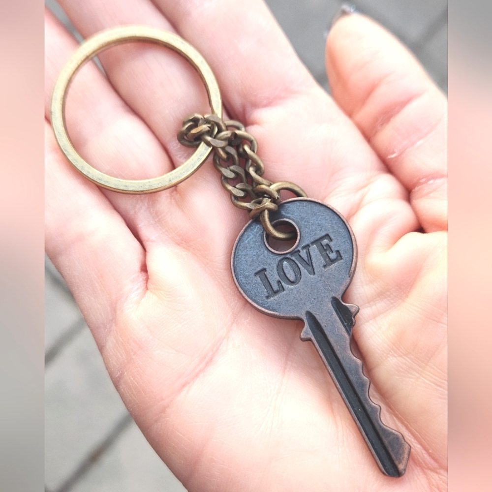 Anthropologie "Love is the Key" Antiqued Brass Keychain